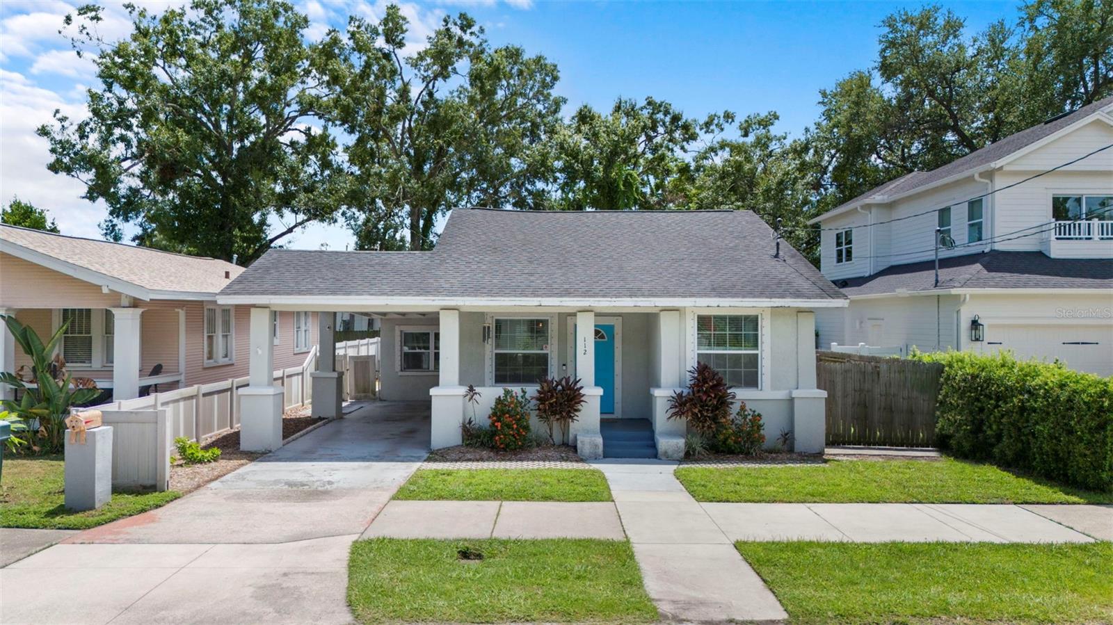 Live the Seminole Heights lifestyle in this Meadowbrook updated 3-bedroom, 2-bath bungalow, where tree-lined streets, vibrant local eateries, and historic charm meet modern convenience. Offering 1,464 sq. ft., a split-bedroom floor plan, and a two-car carport, this home blends character with thoughtful updates for today’s living.
As you arrive, a welcoming covered front porch sets the tone—perfect for savoring your morning coffee or unwinding under the evening stars. Step through the front door and you’re immediately embraced by an abundance of natural light streaming through newer windows and sliding glass doors.
Just off the entryway, the open-concept living room invites you in, featuring crown molding accentuating the windows and doorways, and recessed lighting that continues throughout the home. From here, a hallway leads to your private primary sanctuary—bathed in sunlight and designed for relaxation. This retreat also features a large walk-in closet for all your wardrobe and storage needs. The primary bath boasts gorgeous tile flooring, a granite-topped vanity, a striking subway-tiled walk-in shower, a sleek modern light fixture, and a water-conserving toilet with bidet seat.
Down the same hall, you’ll find the spacious second bedroom with a generous closet and cascading windows. The nearby second bath mirrors the home’s refined finishes with tile flooring, a granite vanity, subway-tiled shower, modern lighting, and water-conserving toilet with bidet seat.
Back toward the main living space, the dining area flows effortlessly into a showpiece kitchen, complete with abundant solid wood cabinetry, a designer tile backsplash, granite countertops, breakfast bar, stainless steel appliances—including a 2024 glass-top range and matching modern range hood.
The third bedroom is located just off the kitchen, offering a roomy closet and versatile use. A large laundry room with tile flooring, storage shelving, and plenty of workspace adds everyday convenience.
Step outside to an exceptional backyard designed for entertaining—fully fenced for privacy and featuring a spacious concrete patio ideal for outdoor dining, weekend BBQs, and gatherings with friends. A large storage shed provides additional space for tools, lawn equipment, or hobby projects, while the layout offers room for both relaxation and play.
Notable updates include: Roof (2018), Water Heater (2019), AC with 10-year warranty (2019), Newer Windows, Refrigerator/Dishwasher/Washer/Dryer (2019), Oven and Microwave (2024).
NO HOA and conveniently located near shops, restaurants, parks, and cultural attractions, this home offers quick access to Downtown Tampa, the Riverwalk, and major highways—making it the perfect hub for both work and play.
This is more than a home—it’s a lifestyle waiting to be enjoyed. Schedule your private showing today! For a virtual tour, click the provided link and experience the beauty of this remarkable property.