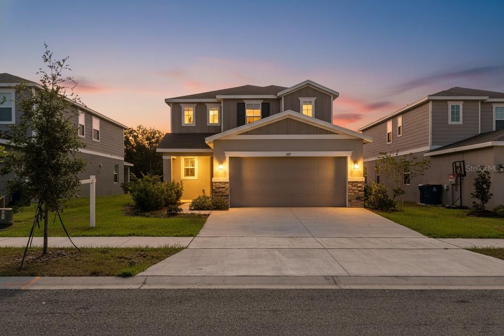 Photo of 821 Blue Creek Drive, Haines City, FL 33844 (MLS # O6405401)
