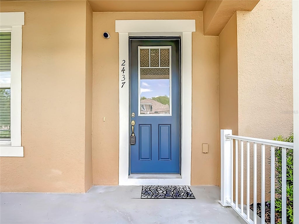Photo of 2437 Varenna Loop, Kissimmee, FL 34741 (MLS # O6430810)