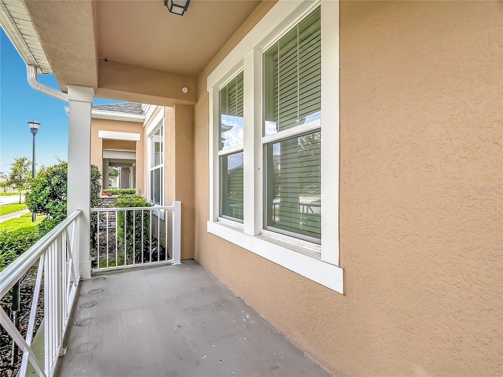Photo of 2437 Varenna Loop, Kissimmee, FL 34741 (MLS # O6430810)