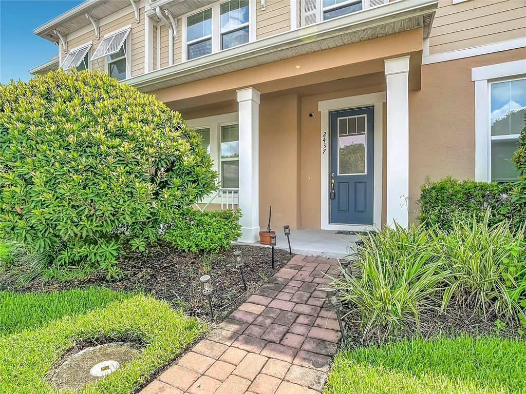 Photo of 2437 Varenna Loop, Kissimmee, FL 34741 (MLS # O6430810)