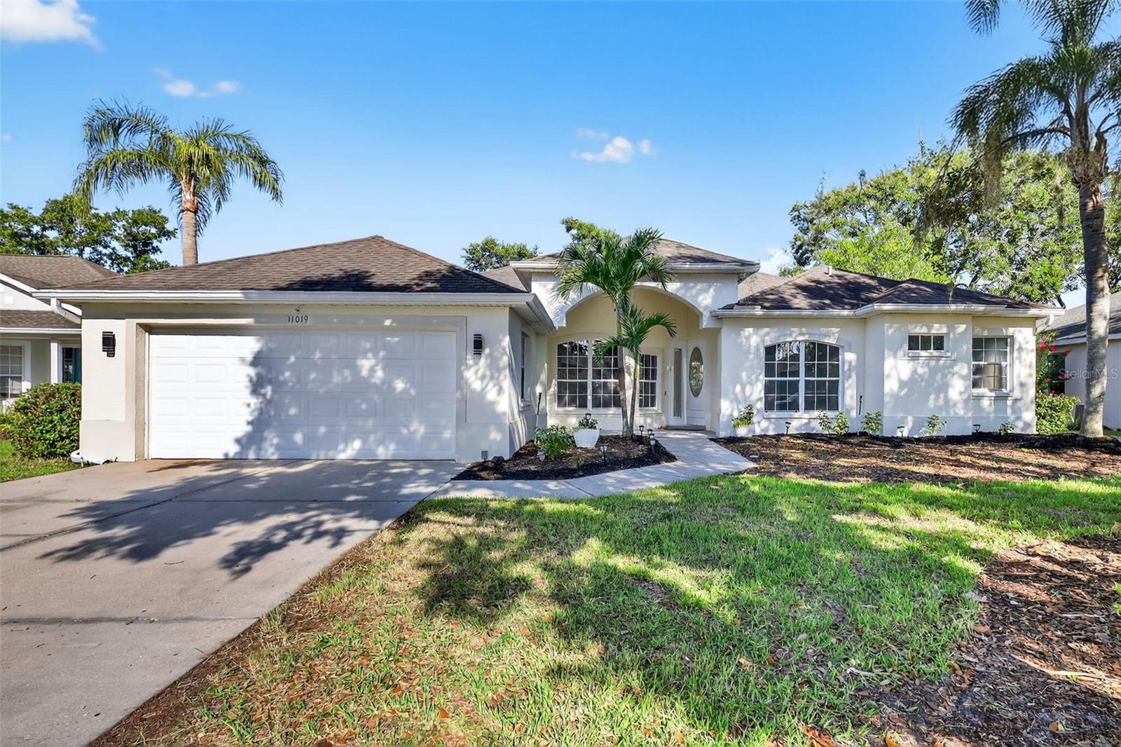 Welcome to this beautifully FULLY RENOVATED 4-bedroom, 4-bathroom home located in the desirable Summerfield Village community of Lakewood Ranch. With 2,317 square feet of updated living space on a spacious 0.26-acre lot, this home offers a perfect blend of comfort, style, and modern convenience. The curb appeal is immediately inviting with meticulously maintained landscaping and elegant palm trees framing the entrance. Inside, natural light pours through large windows, highlighting the sleek luxury tile flooring and open, airy layout. The heart of the home is the thoughtfully designed kitchen, featuring brand-new 2024 stainless steel appliances, expansive quartz countertops, and high-end cabinetry. Whether you're preparing meals for the family or entertaining guests, this kitchen offers both beauty and functionality. The primary suite provides a peaceful escape with large windows overlooking the pool and a walk-in closet for ample storage. The ensuite bathroom offers spa-like finishes including a freestanding soaking tub, a modern glass-enclosed shower with rainfall and handheld options, dual vanities topped with quartz, stylish vessel sinks, and ambient lighting throughout. Step outside into your private outdoor oasis. The screened-in lanai surrounds a sparkling pool and offers plenty of space for relaxing, grilling, or dining outdoors. The backyard is ideal for pets, play, or simply enjoying the peaceful surroundings. Summerfield Village is known for its scenic charm and community-focused atmosphere. Residents enjoy close proximity to parks, top-rated schools, shopping and dining at UTC, and some of Florida's most beautiful beaches. This fully updated home is move-in ready and offers the lifestyle and location that make Lakewood Ranch one of the most sought-after areas on the Gulf Coast.