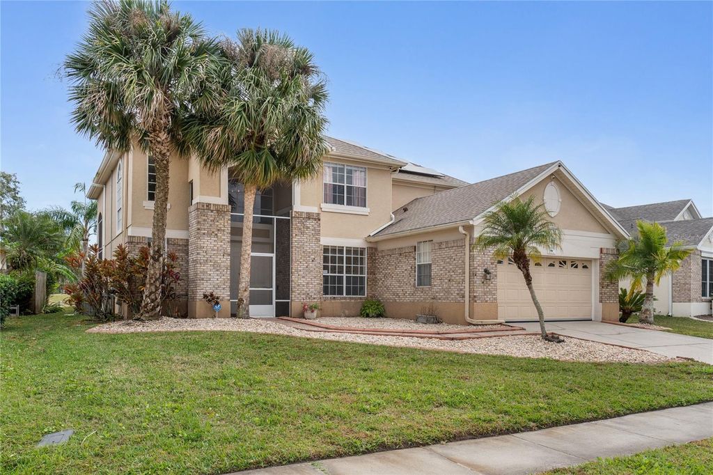Photo of 1524 The Oaks Boulevard, Kissimmee, FL 34746 (MLS # O6371236)