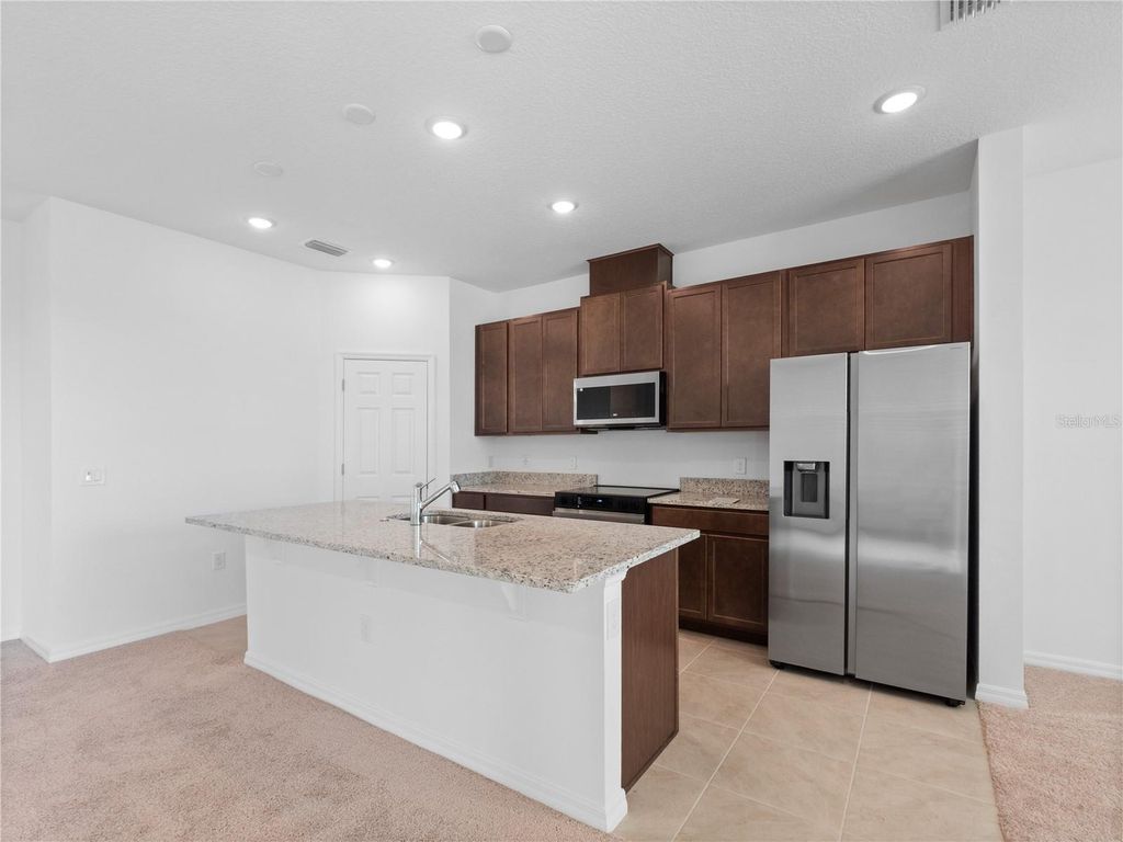 Photo of 329 Marion Loop, Haines City, FL 33844 (MLS # G5108853)