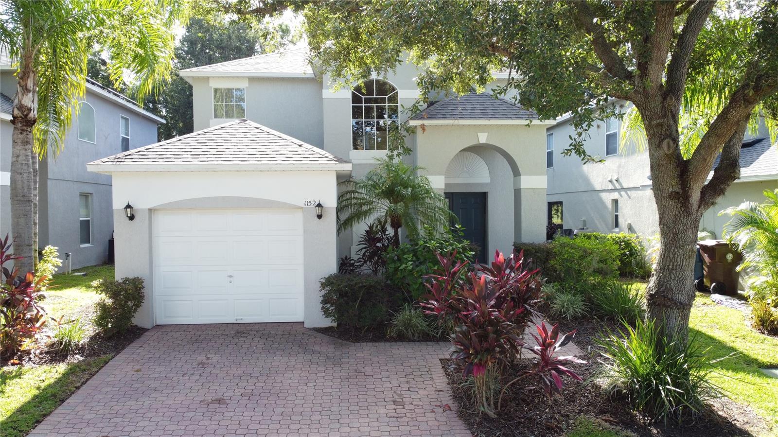 FLORIDA LIVING AT ITS BEST! Welcome to this well maintained 4bed/3bath POOL home located in the award-winning, gated community of SOUTHERN DUNES Golf & Country Club being sold FULLY FURNISHED & TURN-KEY ready! You are welcomed by a handsome paver brick driveway and front walk with updated Exterior paint (2022). Inside, the first level delivers the favorite features of an open floor concept that spans to the lanai. The comfortable sized living room is highlighted by ceramic tile and a neutral, flexible color scheme. The first floor accommodates a full bathroom and a second primary bedroom that has sliding glass doors to the pool area with spectacular views of the lanai and GOLF COURSE. The dining room is also equipped with sliding doors to the pool/lanai. The kitchen features plenty of cabinetry, stainless appliances, a closet pantry and breakfast bar for casual meals, offering additional seating to the dining room and a great place for serving when entertaining family and guests. Comfortable neutral carpet covers the second floor where the spacious primary bedroom features an en suite bathroom that offers a garden tub, walk-in shower, dual sink vanity and a roomy walk-in closet with shelving. The two additional bedrooms upstairs are of ample size and share a full bathroom with a bathtub. One of the nicest features of the home is the screened lanai with views overlooking the 16TH FAIRWAY! The expansive lanai offers sunbathing by the heated pool as well as a covered area for outside dining. The pool enclosure features Florida screens adding additional privacy to the outdoor space, making this a comfortable area for year 'round enjoyment. All the major upgrades have been completed, including NEW ROOF (2022), HOT WATER HEATER (2025), HVAC SYSTEM (2023) and POOL PUMP (2021). This lovely residence is situated in the highly acclaimed championship Southern Dunes Golf Course and Country Club offering 24 hr. security, tennis courts, community pool, fitness center, clubhouse and more. It is a short drive to Orlando or Tampa attractions, airports, shopping, Legoland and to either the Gulf or Atlantic beaches. This property has been managed for many years by a premier property management company in the area and provides consistent and profitable bookings. Whether you make this your primary residence, vacation home or short-term rental, EVERY DAY in this stylish home will make you feel like you are on a permanent vacation! SCHEDULE your showing TODAY!