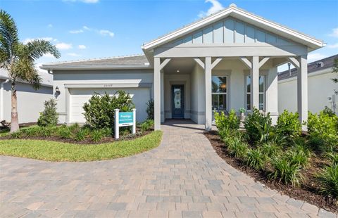 Photo of 10259 Beach Dune Drive, Englewood, FL 34223 (MLS # TB8422298)
