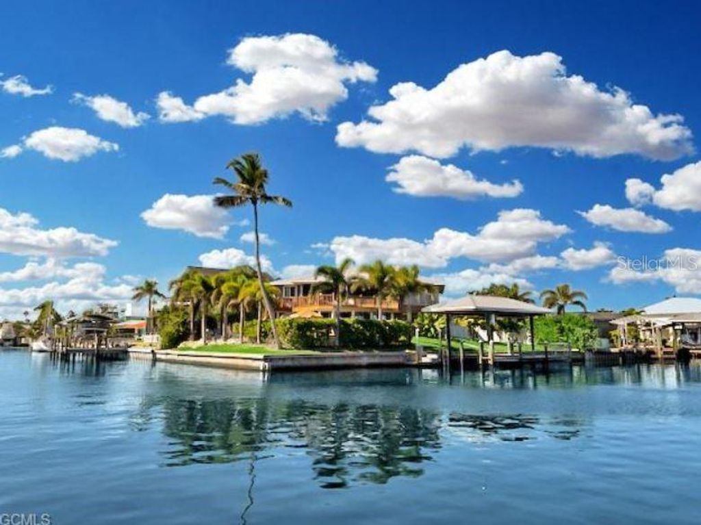 Photo of 3544 Ruby Ave, St James City, FL 33956 (MLS # A4677585)