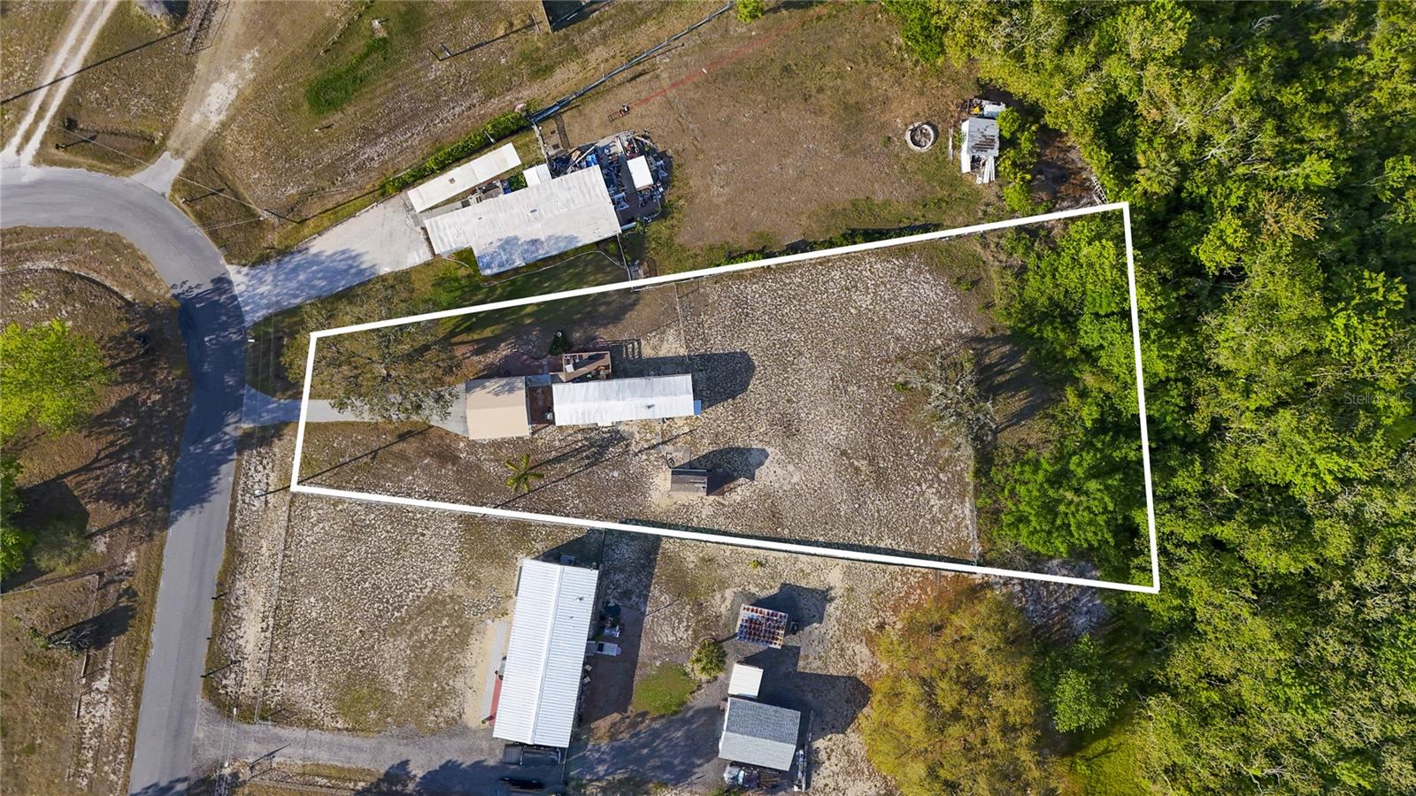 Affordable Mobile Home on a Spacious 0.73-Acre Lot – Location, Location, Location! Looking for an investment opportunity or a place to make your own? This charming 2-bedroom, 1-bath mobile home sits on a generous 0.73-acre lot, offering endless possibilities! Whether you're looking to expand, garden, or create your dream outdoor space. ***THIS PROPERTY HAS LOTS OF POTENTIAL***. Convenient access to shopping, dining, hospitals, schools, and major roadways . With some TLC this home could shine and become a fantastic primary residence or a rental property. Don’t miss this unique opportunity— Contact your agent today for more details!