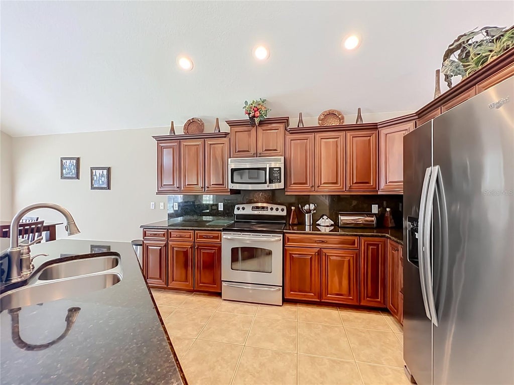 Photo of 9038 Vickroy Terrace, Oviedo, FL 32765 (MLS # O6436448)