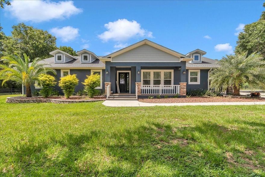 **Modern Luxury Meets Country Living** Welcome to this exceptional 2021 custom-built home, perfectly situated on three serene acres in the heart of Summerfield. Offering the ideal balance of privacy and convenience, you’ll enjoy peaceful country living just minutes from I-75, The Villages, and Ocala. Step inside and experience a thoughtfully designed four-bedroom, three-bath layout filled with natural light, soaring ceilings, and high-end finishes. The open-concept floor plan centers around a **chef’s kitchen** featuring sleek cabinetry, generous storage, and a dramatic waterfall island—perfect for entertaining or everyday living. Multiple living areas provide flexible options for family gatherings, home offices, or guest space, while the **luxurious primary suite** offers a spa-style bath and walk-in closet retreat. Outside, the possibilities are endless. Whether you dream of a garden, workshop, pool, or simply open space to relax and play, this property delivers. With **no HOA** and plenty of room for your RV, boat, or toys, you can finally create the lifestyle you’ve been envisioning. Don’t miss your chance to own a rare slice of Florida paradise. Schedule your private tour today! **Bonus:** Qualified buyers may enjoy a *1-year interest rate buydown* (first year paid by the seller’s preferred lender, subject to credit approval and program availability). Call for details!