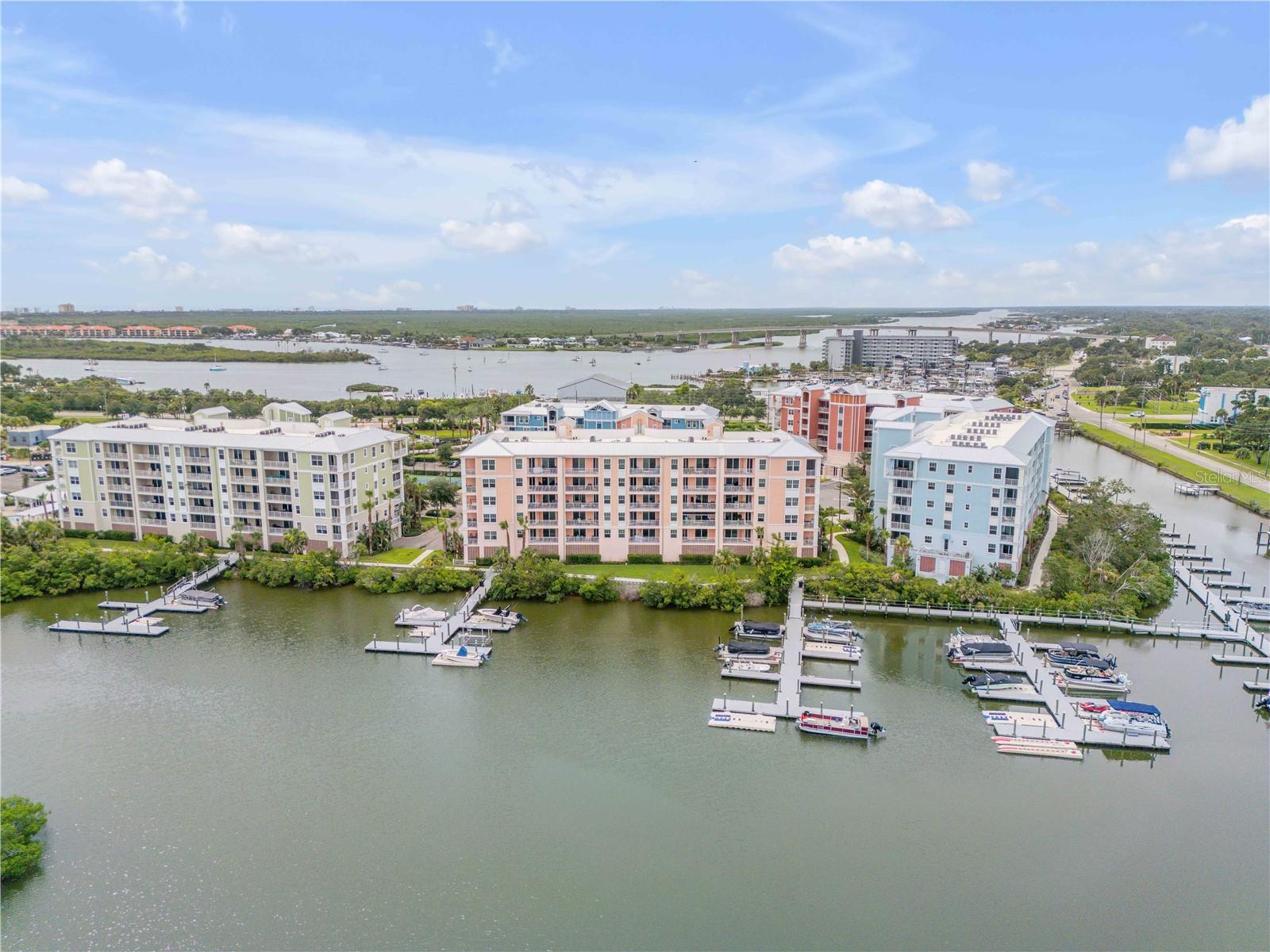 Direct Waterfront 3bdr, 2ba condo home over looking the boat docks, waterways and barrier islands. Wake up to amazing sunrises and peacefully sleep with dreamy sunsets. Welcome to 4 Riverwalk Drive where the north facing end units are considered by most as the best. Boat slip is available and deeded. Riverwalk is a gated community built in 2020 in a location very conducive to a laid back lifestyle. 3 Bedrooms, 2 bath and an open floor plan including 2 large balconies that bring the outside in, one adjacent to the family room and another off the master bedroom. All rooms take full advantage of stunning views of the Indian River, Ponce Inlet, and Ponce De Leon lighthouse! Upgraded throughout. The Riverwalk community amenities include a clubhouse, large pool, hot tub, fire pit, tennis/pickle-ball, shuffleboard, bocce ball and gas grills. Located in the heart of New Smyrna Beach on the North Causeway, within walking distance to the city marina and to Canal Street, where you will find great restaurants and unique shops or to Flagler Ave for more shops and restaurants, the Atlantic Ocean for a day at the beach. Schedule your showing today.