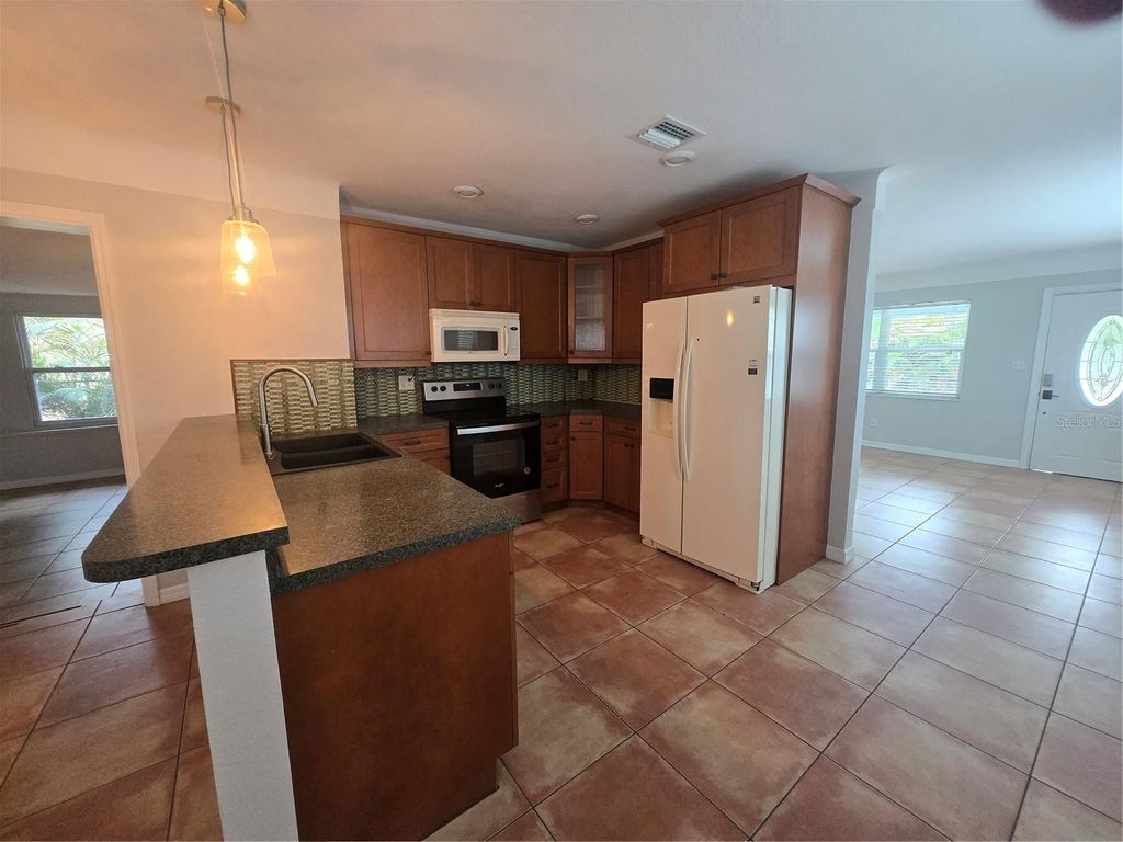 Photo of 5721 10th Avenue N, St Petersburg, FL 33710 (MLS # TB8431808)