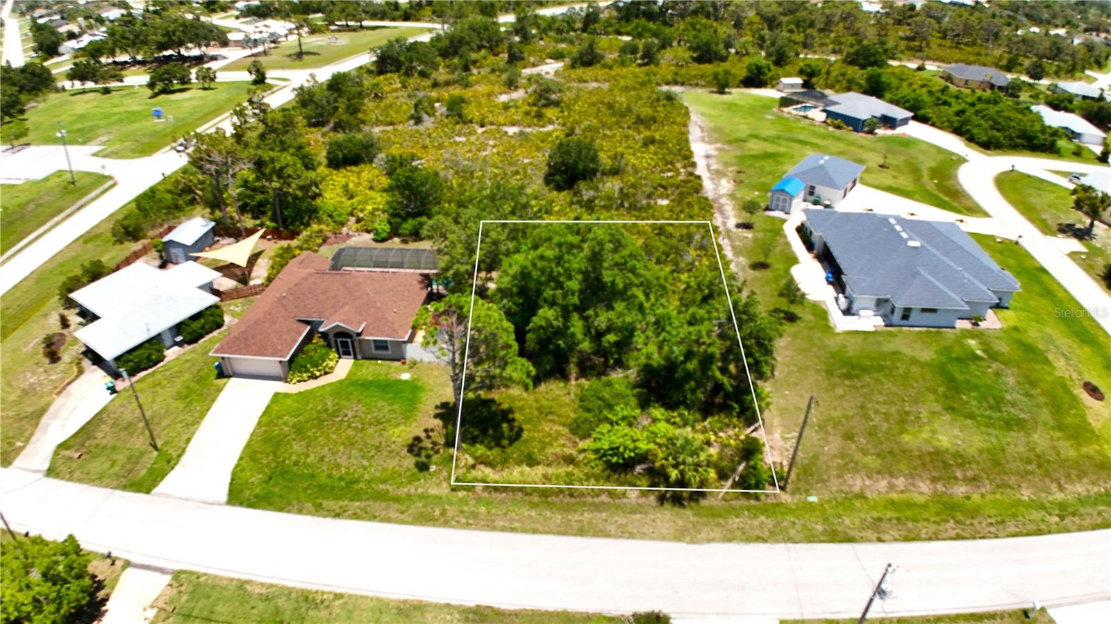 Build Your Dream Home in East Englewood: Embrace Southwest Florida Living. Imagine building your custom home in East Englewood, Florida, perfectly situated just five miles from the Gulf beaches at Englewood Beach. This vibrant and welcoming community offers an unparalleled Southwest Florida lifestyle. This specific lot is ideally located less than 1.5 miles from the renowned Ann & Chuck Dever Regional Park. This expansive park is a true community gem, featuring a gym, pool, playground, pickleball, volleyball, disc golf, and a paw park, ensuring there's something for everyone. You'll love this delightful neighborhood, characterized by its mix of well-maintained existing homes and beautiful new construction. The area offers incredible access to a variety of attraction that include fishing, boating, nature walks, Dearborn Street & Old Englewood Village with its shops, restaurants, farmers market and regular entertainment. Enjoy scenic drives through Placida and onto Gasparilla Island to visit Boca Grande, celebrated for its charming town, pristine beaches, world-class tarpon fishing, and authentic old-Florida charm. This East Englewood location truly offers the best of Southwest Florida living, combining convenience, recreation, and natural beauty.