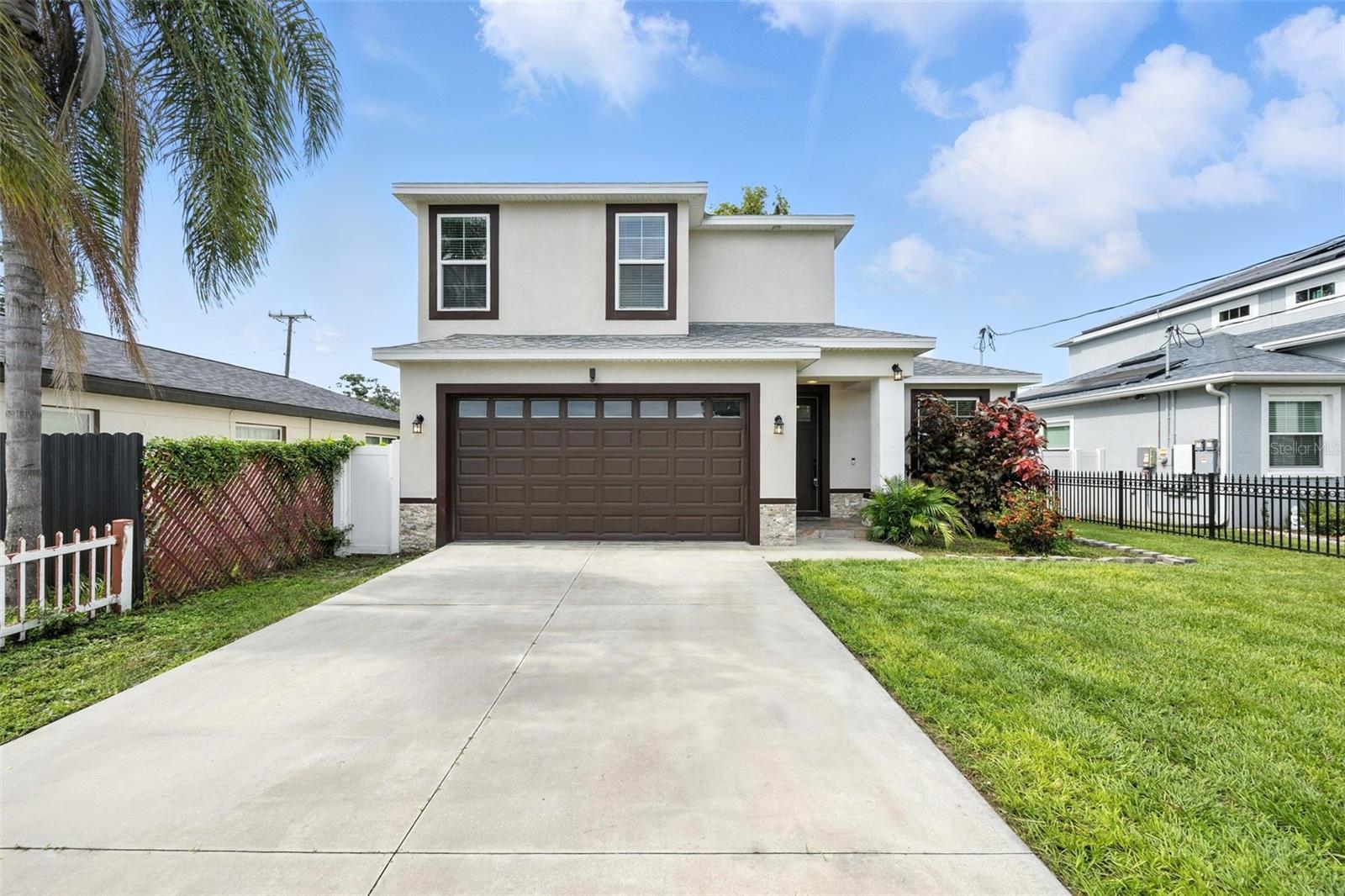 Modern Elegance in the Heart of Tampa!
Built in 2021 and just 12 minutes from downtown Tampa, this stunning home blends modern comfort with smart design. Featuring 3 spacious bedrooms plus a versatile flex room, 2.5 bathrooms, and a 2-car garage, this home offers both space and style for today's lifestyle.
The fully fenced yard includes a motorized front gate for added security and peace of mind—perfect for pets and kids to play safely. The backyard is a true retreat, with a beautifully paved brick lanai, built-in fireplace, and a storage shed for your tools and gear.
Step inside to soaring 9'4" ceilings, luxury 100% waterproof vinyl plank flooringthroughout, and a bright, open layout. The gourmet kitchen boasts 42” solid wood cabinets with crown molding, granite countertops, tiled backsplash, and a breakfast island—ideal for entertaining.
The great room flows seamlessly into the kitchen, creating the perfect space for gatherings. Downstairs also features a flex room that can serve as a home office, gym, or guest suite.
Upstairs, the primary suite offers a spa-like en-suite bathroom with dual granite sinks, a free-standing soaking tub, and a separate tiled shower, plus a large walk-in closet. You’ll also find a generous laundry room and smart storage throughout.
Smart features include Ring doorbell, LED lighting, energy-efficient Low-E double-pane windows, and smart sensors to help reduce energy bills.
This home checks every box—modern, secure, energy-efficient, and move-in ready. Schedule your private showing today