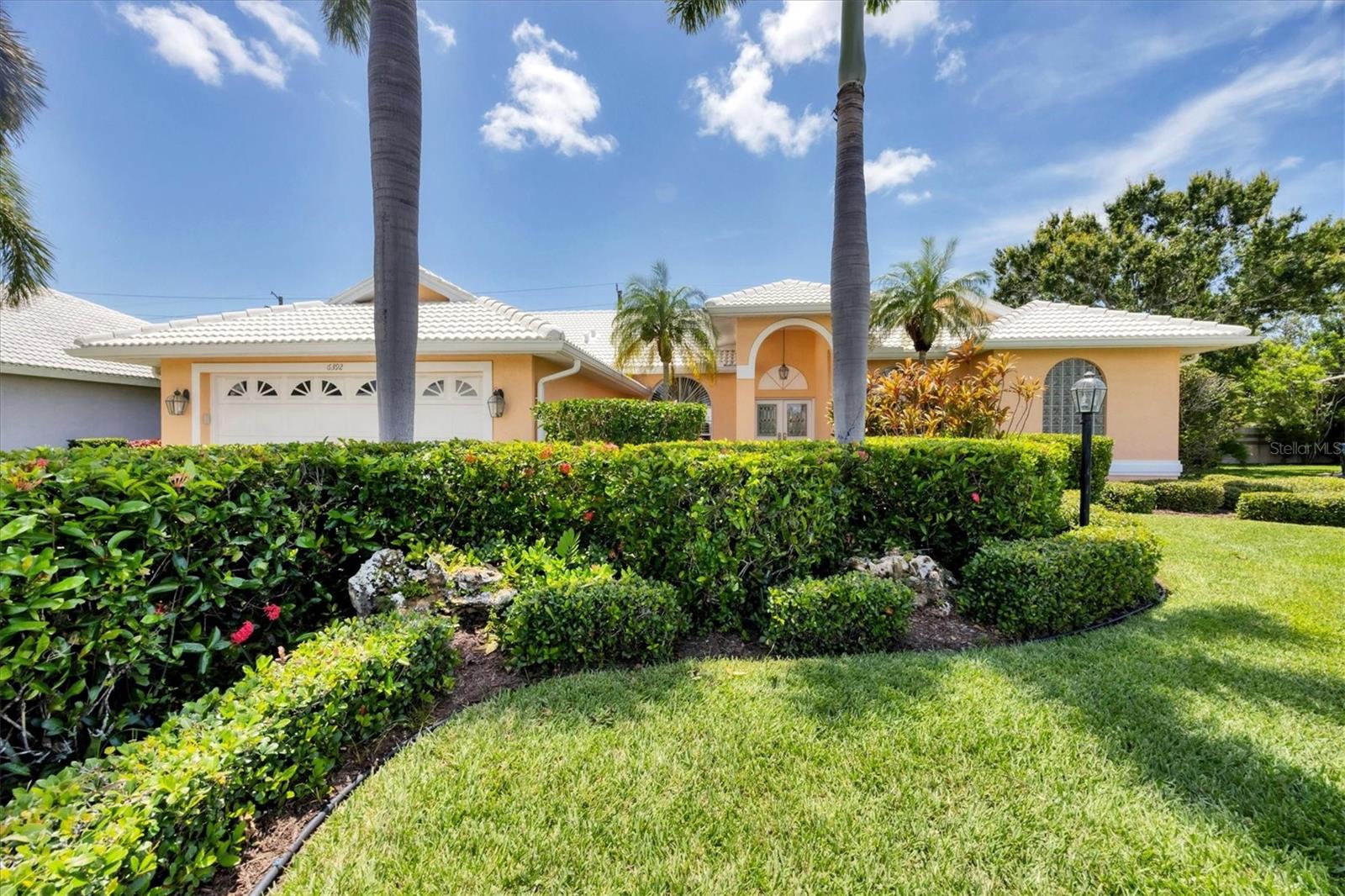 Seasonal/short term turnkey furnished home. Spacious beautifully renovated single family home in quiet convenient neighborhood on a cul-de-sac downtown Sarasota. This home is flooded with natural light from abundant windows and has a vaulted ceiling to enhance the open planned design. The open floor plan makes family time and entertaining easy with a den and living room. The furniture is new and stylish with comfort in mind. The kitchen boasts solid wooden cabinetry topped with slab granite counters with breakfast bar, stainless steel appliances, built in desk, eat in space in the kitchen and pantry. The primary bedroom is very large with a king bed, door to lanai, en suite bathroom with dual vanities, soaker tub, separate shower and roomy walk in closet. The other bedrooms are split plan and there is also a private office. The laundry room has full sized machines, utility sink and loads of cabinetry for extra storage. The two car garage has an epoxy floor and is immaculate just like the house. Want to enjoy outdoor entertaining yet keep the bugs away-you can with a large screened in lanai with covered seating as well. This home is well located and convenient to shopping, casual and fine dining, excellent schools, downtown Sarasota with theater, opera and museums and only 10 minutes to Siesta Key, the number one beach in the country. Call today to lock in your time in the sun!!