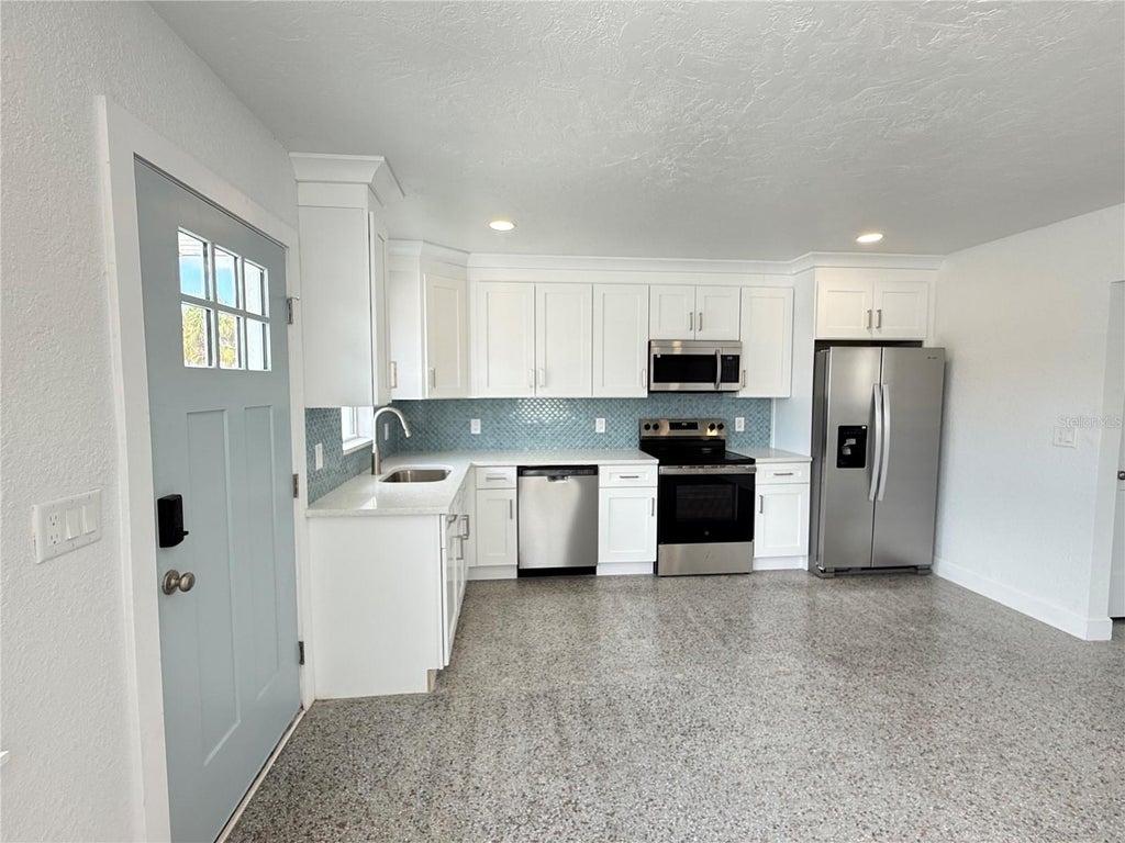Photo of 119 147th Avenue E #B, Madeira Beach, FL 33708 (MLS # TB8550154)