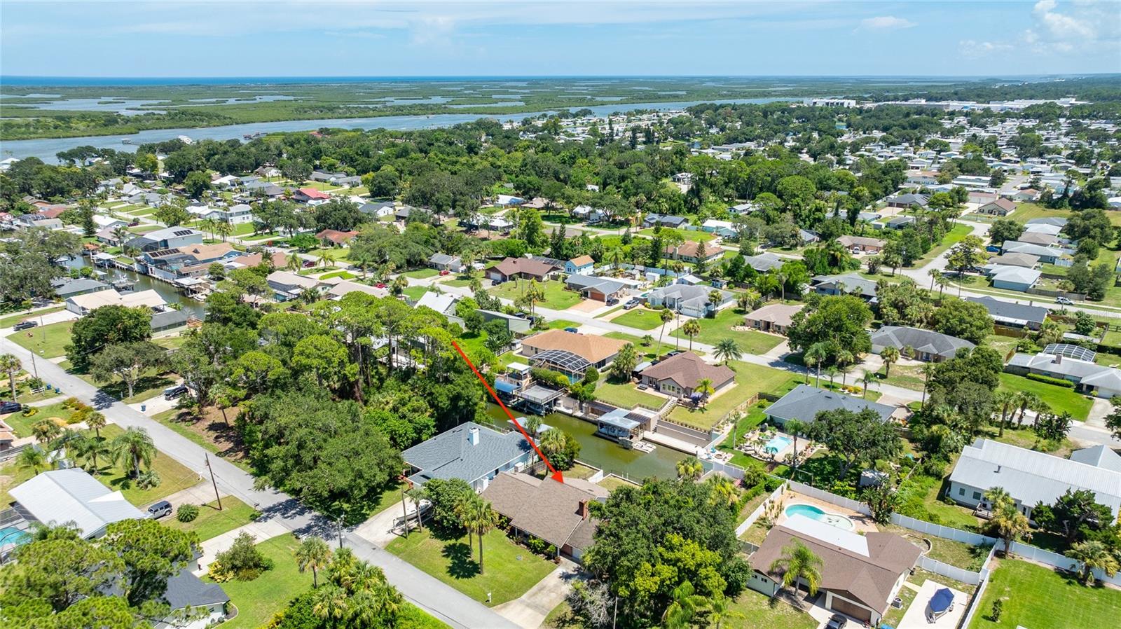 Deep Water Canal Front Home on a Huge 100 x 140 Lot. 100 ft Frontage on the Canal with a Huge Yard on a Quiet Street with Other Beautiful Homes. This Canal has Access to the Intracoastal and some of the best Boating and Fishing in the County. This Home is Clean, Large. and Spacious and ready for a New Owner. The Yard is Oversized and has the potential for any type of purpose. Room for Docking Multiple Boats on the long well maintained Sea Wall. Make You Appointment Today !!!!!!