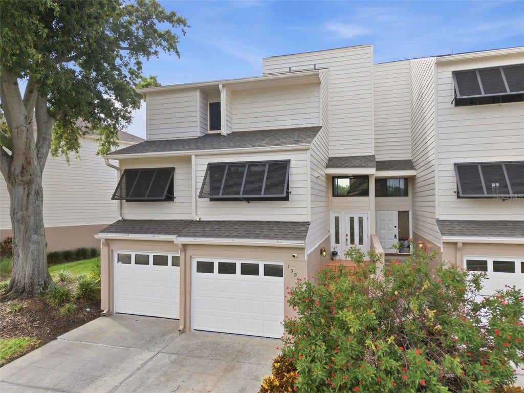 Photo of 13956 Lake Point Drive, Clearwater, FL 33762 (MLS # TB8550616)