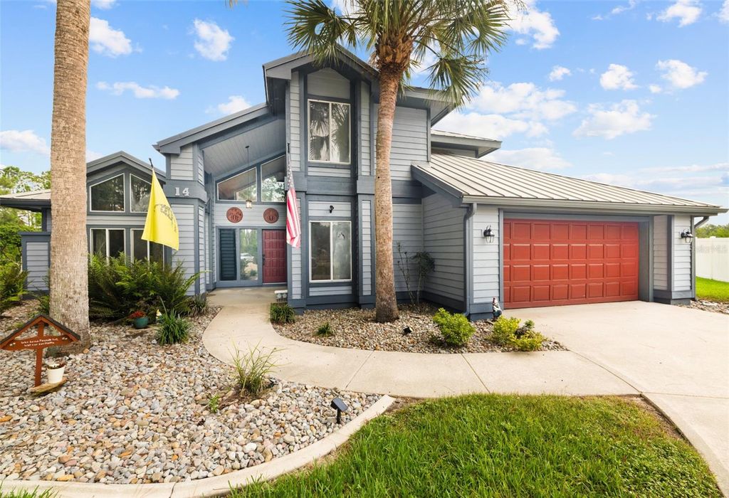 Photo of 14 Lake Place, Palm Coast, FL 32137 (MLS # FC312360)