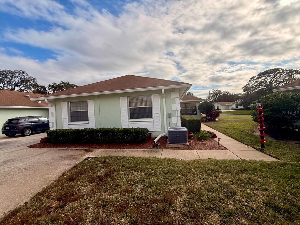 Photo of 8350 High Point Circle #3, Port Richey, FL 34668 (MLS # W7881529)