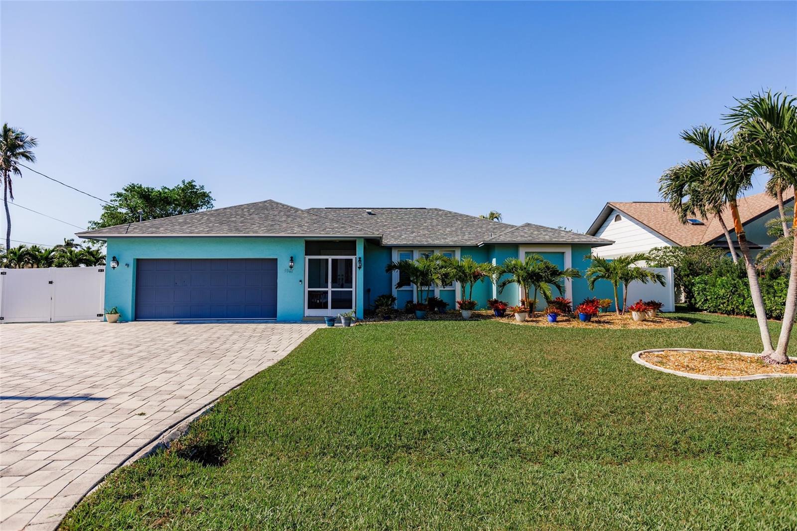 This is absolutely the best gulf access boating location in all of Cape Coral, less than 10 minutes to the River and then out to the Gulf of Mexico for the best fishing in the world. Sought after location in 33914 Zip that is close to everything. This home has been lovingly maintained and updated over the past eleven years by the same owner. Home is a solid built Oyster Bay home with many upgraded features including travertine flooring, large crown molding and an open floorplan. The large extended paver driveway can easily accommodate 6 or more cars, and behind the gated vinyl fence, there is room for another car, or you can store your boat and/or trailer. The same paver is used in the huge under truss lanai and the lanai ceiling is beautiful tongue and groove The extended lanai can easily be a summer kitchen -- water and electricity are there. The same paver is used as a pathway down to the 10k pound TREX wrap around boat dock with a 30' canopy. Main bedroom has new flooring and the main bathroom is completely new -- never even used. Home is set up with split bedrooms to allow privacy for guests. Current owner has home set up with a living room and formal dining, but the possibilities are numerous. Each bedroom has a walk in closet, all hurricane impact windows and sliders, and a remodeled laundry room that can double as a butler's pantry. The interior of the home has had NO water intrusion during any hurricane. Roof is 2020, impact windows 2022, boat canopy 2023, TREX wrap around dock 2020, pool cage 2024, laundry room 2020, main bathroom 2024, Hot Water Heater 2025 -- all other items have been updated over the last 9 years. Pull out drawers in the kitchen pantry and under counter lighting that can change color throughout. Effective year built is 1992. Seller financing available: 20% down payment, 6% interest only and balloon in 3 years or less.
