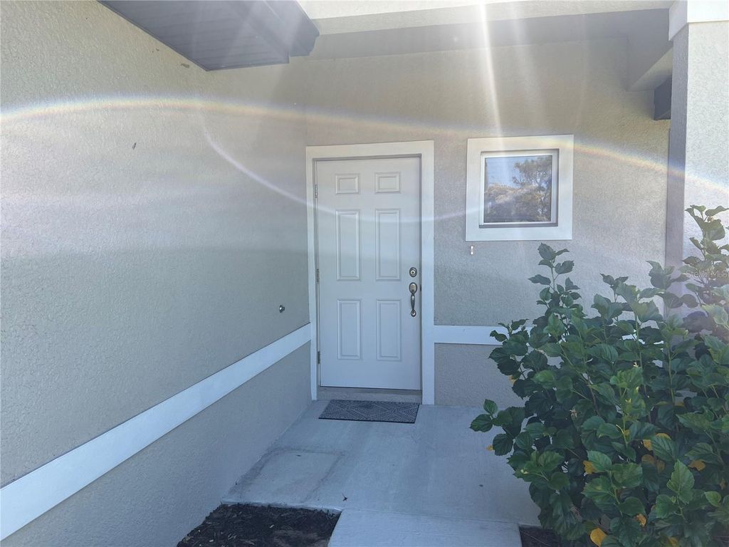 Photo of 9230 Agate Street, Port Charlotte, FL 33981 (MLS # C7514363)