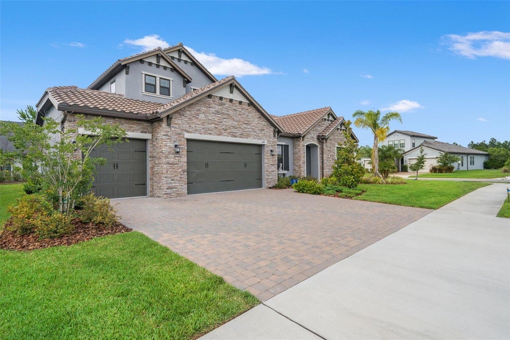 Photo of 6170 Marsh Trail Drive, Odessa, FL 33556 (MLS # W7886442)