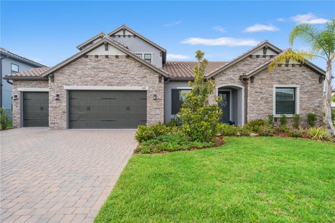 Photo of 6170 Marsh Trail Drive, Odessa, FL 33556 (MLS # W7886442)