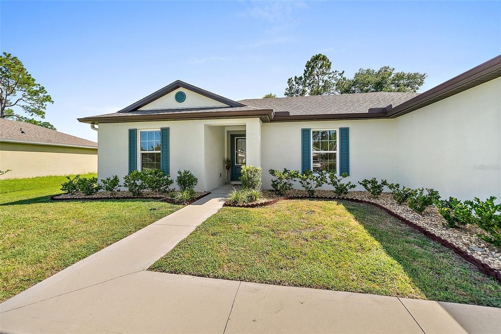Photo of 21 Wheeler Lane, Palm Coast, FL 32164 (MLS # FC313559)