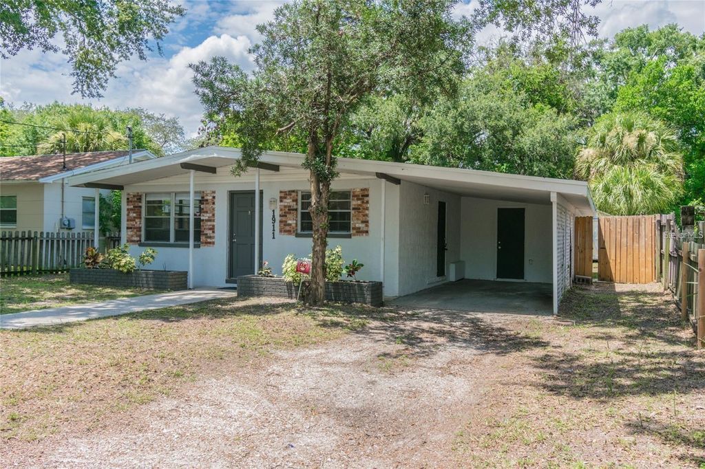 Photo of 1911 W Saint Conrad Street, Tampa, FL 33607 (MLS # TB8472414)