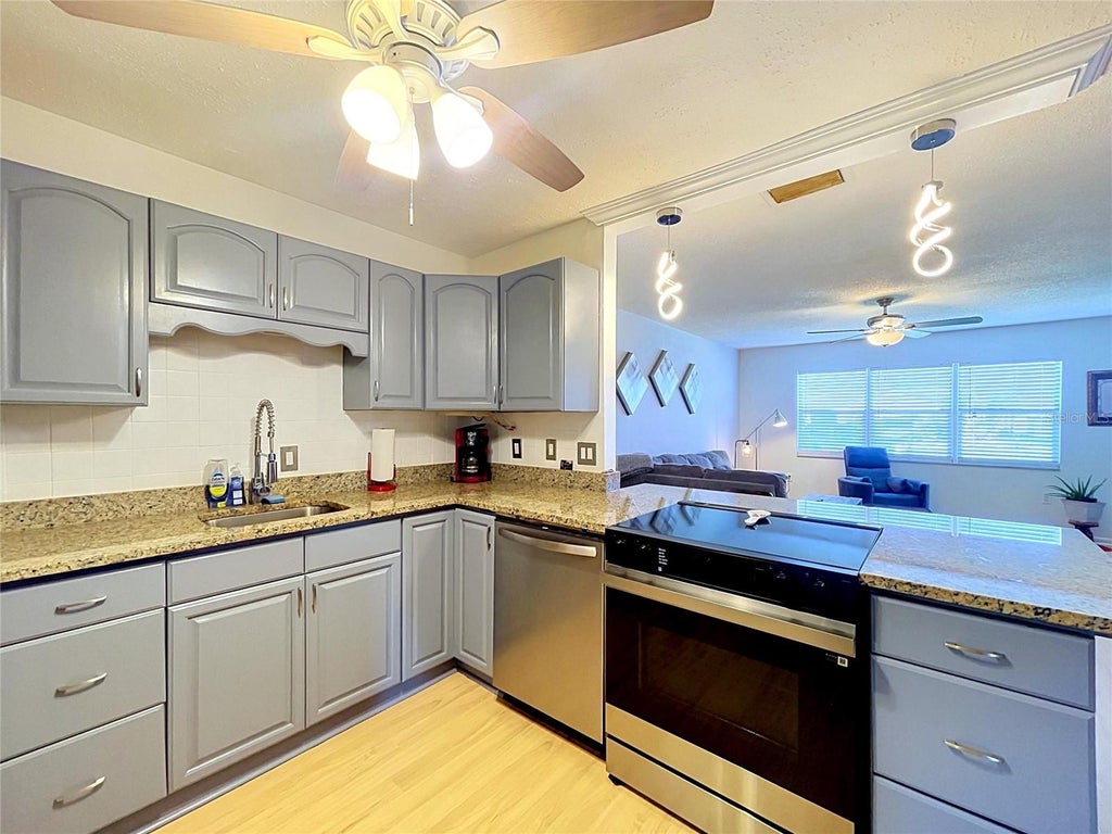 Photo of 1520 Belle Glade Avenue, Sun City Center, FL 33573 (MLS # TB8553263)