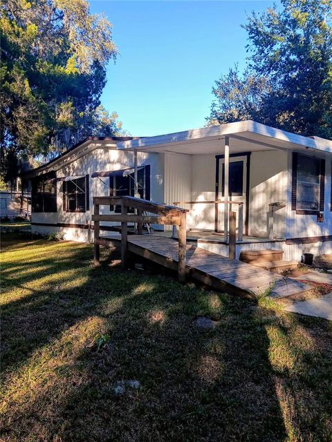 Photo of 25210 NE 133rd Street, Fort Mccoy, FL 32134 (MLS # O6330423)