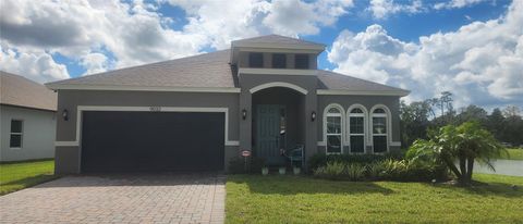 Photo of 9032 Cape Cod Road, Deland, FL 32724 (MLS # V4945579)