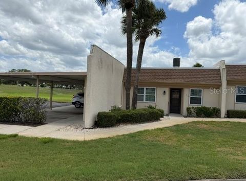 Photo of 11130 Carriage Hill Unit 1 Drive, Port Richey, FL 34668 (MLS # W7886103)