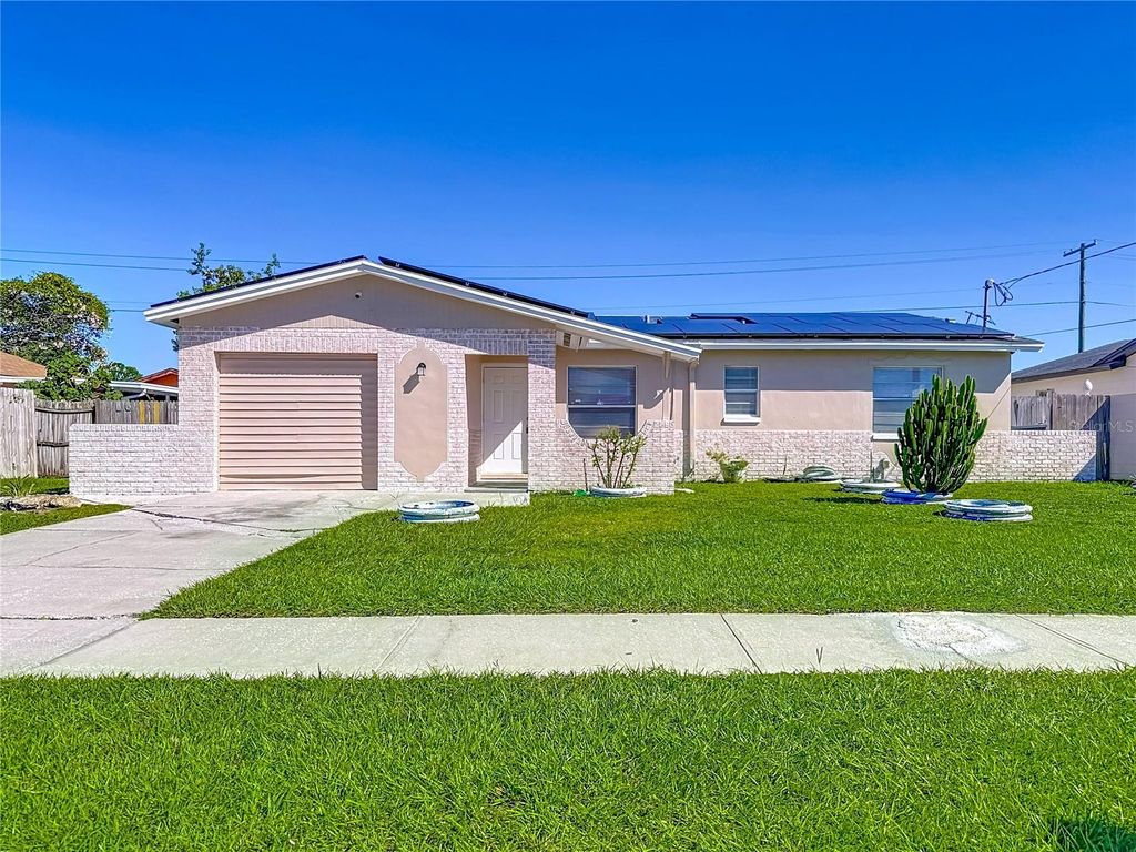 Photo of 6419 W Paris Street, Tampa, FL 33634 (MLS # TB8431845)