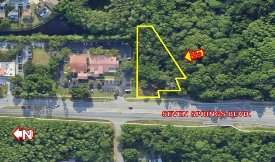 Beautiful 1.69-acre vacant parcel zoned PO-2 (Professional Office District) in Southwestern Pasco County, next to the Trinity sub-market. Property can be developed for Professional Offices or Services, or Business Services (such as Financial, Accounting or Brokerage services) or Personal Services (hair, dry cleaners, florists), but most importantly in this district for medical offices and hospitals. The area already has specialists such as cosmetic surgeons (next door), orthopaedical offices, a veterinarian clinic, and Helen Ellis Medical Arts Center.

This is a great opportunity as it is the last parcel in the Professional Office District to be offered for sale to developers/investors or to specialist physicians to develop a Medical Arts Building up to 6,400 SF. Concept plan as shown below is presented by Regency Design & Engineering in concert with preliminary pre-development review by Pasco County.  Periphery wetlands are being delineated by SWFWMD in AE zone, while building will remain in X and X-500 zones with no flood insurance required. Higher than required parking ratio with 40 spaces. Carpe Diem and contact Philippe Beau or Don Wallace.