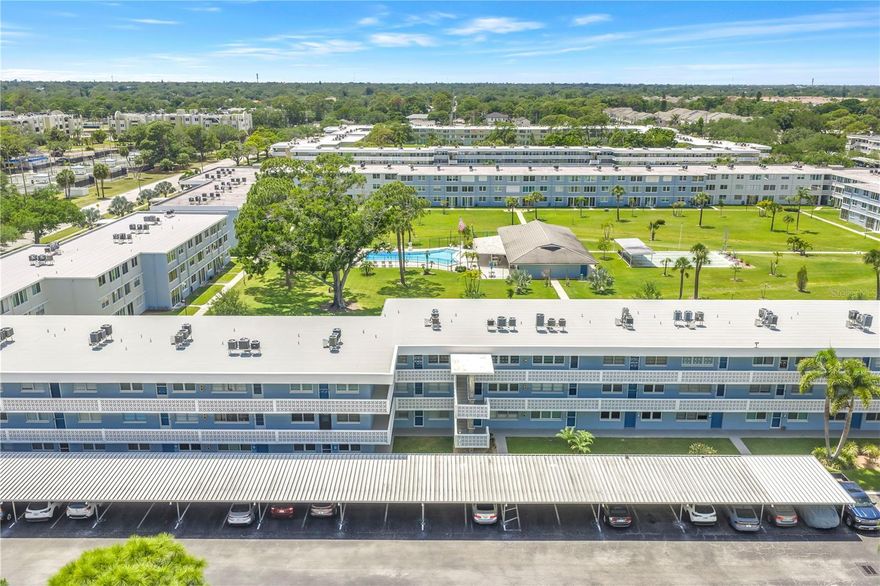 Enjoy life in this superbly maintained 55+ community-Winston Park condo. 1st floor unit - completed renovated with HURRICANE RATED sliding doors that open to the central courtyard. Walk right out your back door and enjoy the fabulous amenities amenities and activities in the clubhouse, at the heated pool, shuffleboard courts, BBQ grills and well-maintained grounds and courtyard with walking paths. and green space offered. You're just minutes away from shopping, dining, medical facilities, and everything you need. Great biking trail right in front of the community directly connected to downtown. Shopping is convenient at Northeast Park Center including Publix and Whole Foods. Monthly fee includes exterior maintenance, manager, cable, internet, water and garbage and sewer. Residents must be 55+ / no dogs. The laundry room on every floor, just steps from the unit. A large living / dining room leads through to the spacious kitchen with white shaker cabinetry, brand new stainless steel appliances and bright and sunny breakfast room / flex space overlooking the outdoors. A private main bedroom features a walk in closet and full bath with tub/shower. a guest bath just off the kitchen is perfect for guests. HVAC replaced 2010, WATER HEATER 2026, luxury vinyl flooring with ceramic tile.