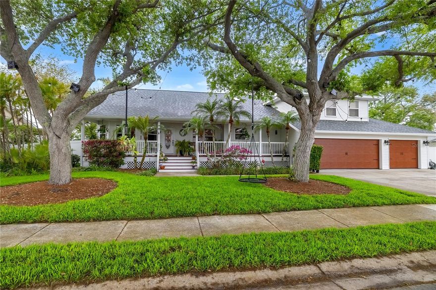 Welcome to the sought after location of Snead Island! This exceptional home blends modern style with the peaceful beauty of its natural surroundings. Featuring 3 bedrooms, 2 bathrooms, and a spacious bonus room that can easily serve as a 4th bedroom, this residence offers the perfect balance of comfort, functionality, and charm. From the moment you arrive, lush landscaping and inviting curb appeal set the tone for what awaits inside. The open and spacious layout is filled with natural light, creating a bright and welcoming atmosphere ideal for both everyday living and entertaining. At the heart of the home is the beautifully updated kitchen, complete with stainless steel appliances, sleek granite countertops, ample cabinetry, and a large breakfast bar accented with luxury reclaimed wood and additional seating. Just beyond the kitchen, the expansive living and dining room combination provides the perfect gathering space. The thoughtfully designed split floor plan offers privacy and comfort. The generously sized primary suite serves as a true retreat, featuring a full walk-in closet and a beautifully appointed ensuite bathroom with a custom walk-in tiled shower. On the opposite side of the home, the second and third bedrooms enjoy their own private space with convenient access to a full bathroom. Step outside to the spacious screened-in back deck, the ideal place for outdoor dining, entertaining, or simply relaxing while taking in the stunning sunsets and serene Snead Island setting. The fully fenced, well-manicured yard provides plenty of room for outdoor enjoyment and peaceful evenings under the stars. Additional features include a whole-house central vacuum system, a massive 900 sqft 3-car garage with epoxy flooring, air conditioning in the garage, generator hookup, 50-amp hookup, and a private extended side driveway for added convenience. A few of the many updates include new landscaping, 2 year old roof, 2 AC units replaced and 3rd having a new motor, softs/gutters, garage doors, rebuilt deck, ceiling racks, and much more. Home sits on a full oversized lot and half. Snead Island offers a rare sense of seclusion and tranquility while still being just minutes from modern conveniences. Residents enjoy close proximity to the Bradenton Yacht Club, Emerson Point Preserve Park with 365 acres of walking trails, kayaking, and beach access, as well as easy access to Bradenton, St. Petersburg, Tampa, and Sarasota. Schedule your private showing today and experience the beauty and lifestyle of Snead Island for yourself.