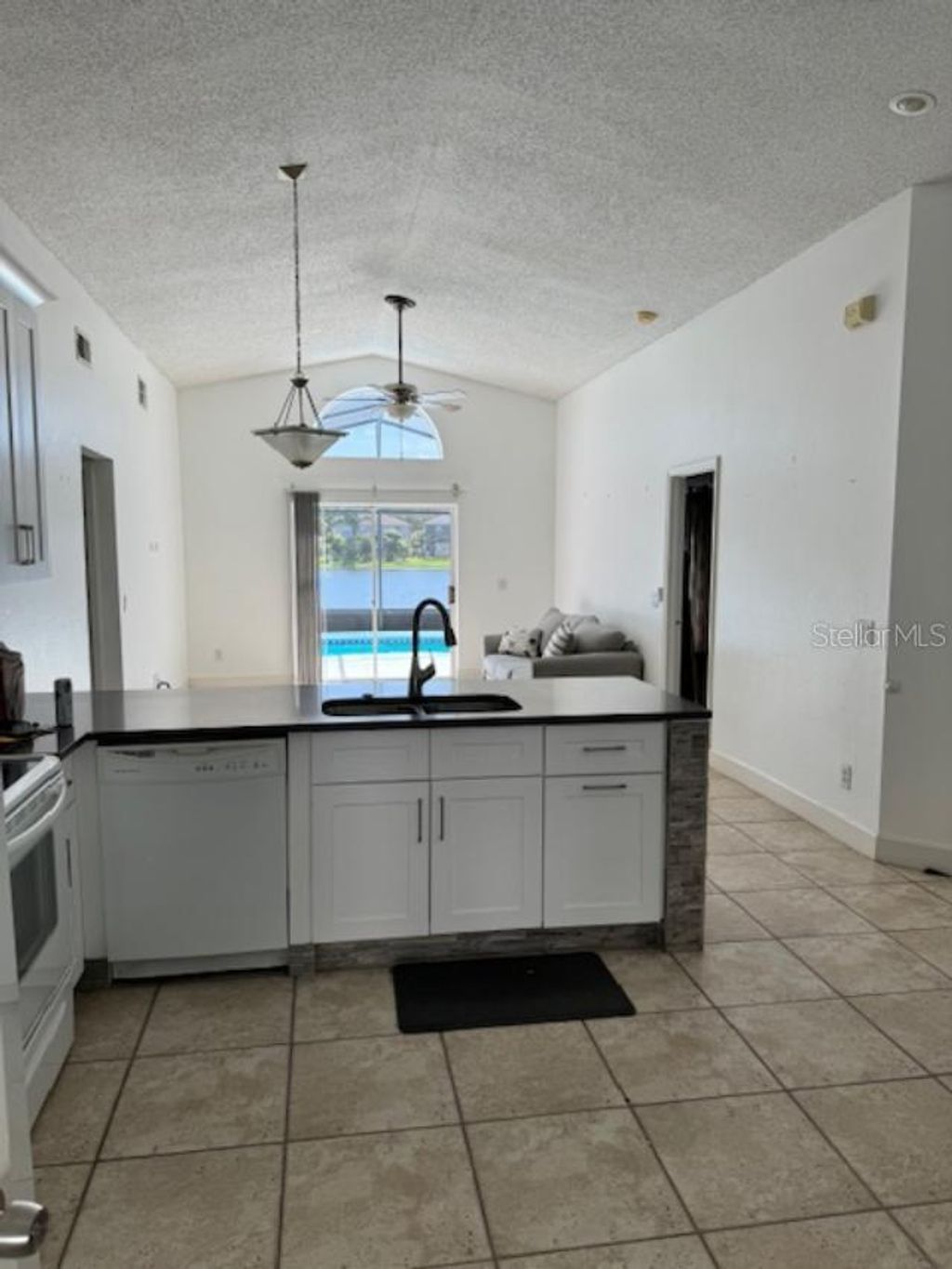 Photo of 1623 Bridgeview Circle, Orlando, FL 32824 (MLS # O6397152)