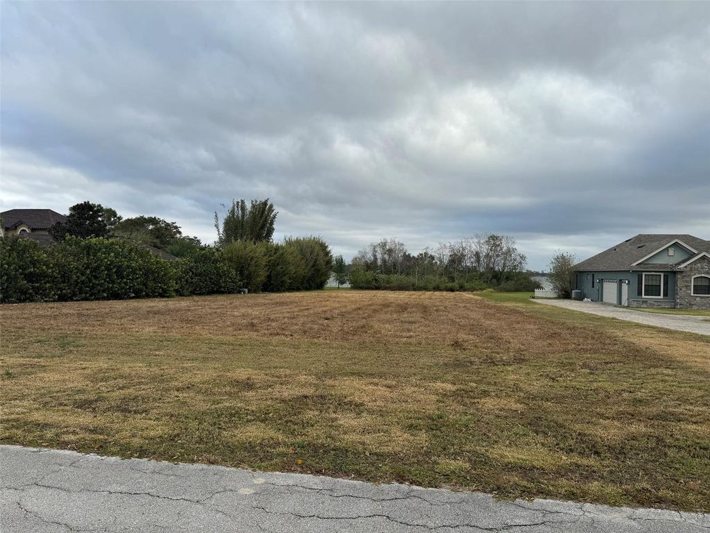 Photo of 2060 Kennwood Grove Lane, Auburndale, FL 33823 (MLS # TB8452510)