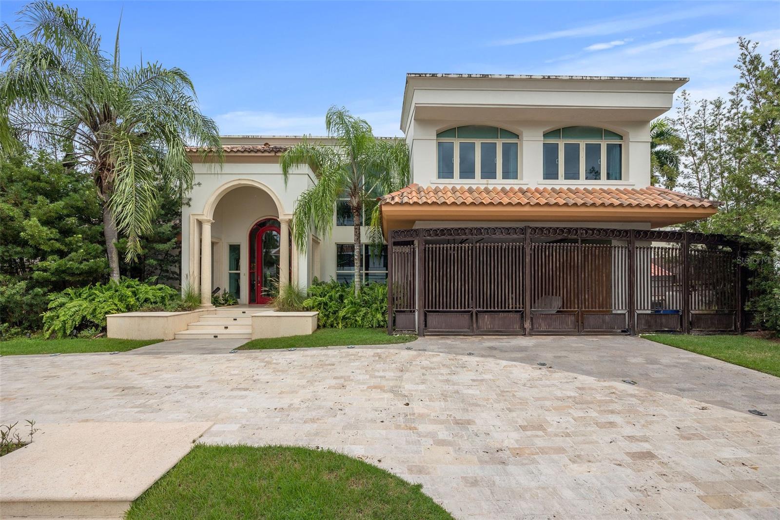 This stunning corner property combines modern elegance with ultimate comfort, offering six spacious rooms, each bedroom featuring its own private terrace or balcony, en-suite bathroom, and walk-in closet. The home also includes a gym, an office, a maid’s quarters, and a well-appointed laundry room, ensuring every need is met.
The expansive living areas include a large kitchen, a cozy family room, a formal dining room, and an inviting living room, perfect for both relaxing and entertaining. Outdoors, a beautiful pool is complemented by a spacious terrace, BBQ area, and gazebo, providing the ideal setting for gatherings or tranquil evenings surrounded by lush landscaping. A two-car garage adds convenience to the property's thoughtful design.
This residence is equipped with a full-power generator and a water cistern, ensuring comfort and functionality at all times. Situated on a prime corner lot with quick access to the highway, this home offers both privacy and easy connectivity.
Experience the pinnacle of luxurious living in this remarkable San Juan estate in the prestigious Jardines de Caldas neighborhood.