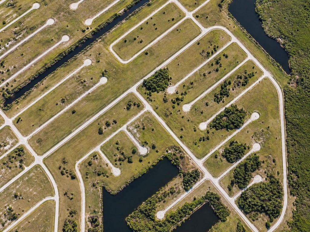 Photo of 12521 Chilipepper Drive, Placida, FL 33946 (MLS # TB8556558)