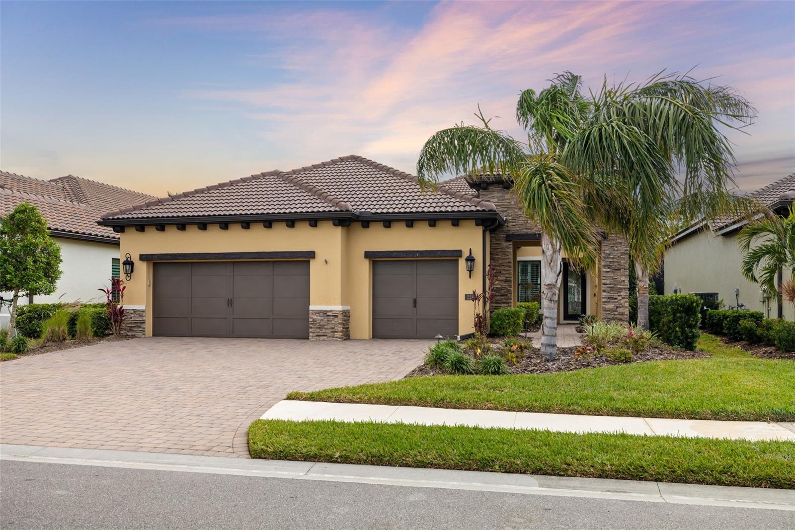 GREAT VALUE! Located in ARIA, a Neal Signature development in Nokomis FL, this incredible property with after-market upgrades makes this a great value and opportunity for you to own a wonderful home that lives like new. The 12’ coffered ceiling and shiplap featured wall in the living room, wainscotting in the dining, and crown molding throughout sets the stage for the wonderful vibe and lifestyle you deserve. At every turn you feel and see the beauty from the custom window treatments, plantation shutters, beautiful light fixtures, high-end ceiling fans to the mixed flooring. What you can’t see are the LED recessed dimmable lights with wall controllers, energy efficient light sensors in several of the rooms, soft close doors and drawers, pull out cabinet shelving, and must-have closet organizers in the two primary walk-in closets as well as in the garage. This open floorplan makes this 2400+ home feel much larger allowing for easy, circular flow from the office/den, kitchen, living, dining through to your bedrooms or to your outside lanai. The beautiful pool and spa are salt water and heated by energy efficient natural gas. If you desire a summer kitchen, start designing because the natural gas line is ready to be connected! The chef-inspired kitchen is equipped with all the best features that will make cooking and entertaining a joy! We know that safety is always front of mind and the sellers contribute zero property damage from storms and hurricanes, since being built, to the elevated berm and 6’ concrete privacy wall in the back. There are several impact windows, a hurricane rated front door and garage doors, along with storm shutters for your added protection. Spanning over 150 acres of beautifully landscaped grounds, this master planned community is gated with resort-style amenities from the Residents Clubhouse, offering multiple gathering areas to the state-of-the-art fitness center, and a resort-style pool and spa. There are 4 pickleball courts and an inviting activity lawn, too. This prime location will afford you easy access to historic downtown Venice, the up and coming, already vibrant, Downtown Wellen, Hwy 75 for traveling north or south for dining, shopping, healthcare visits or accessing one of multiple airports in our region. How about some beach time?! Living here you will have easy access to 5 of our 14 beaches in Sarasota County! This is more than a home; it’s a lifestyle that awaits you! Please contact me today to schedule your private or virtual tour!