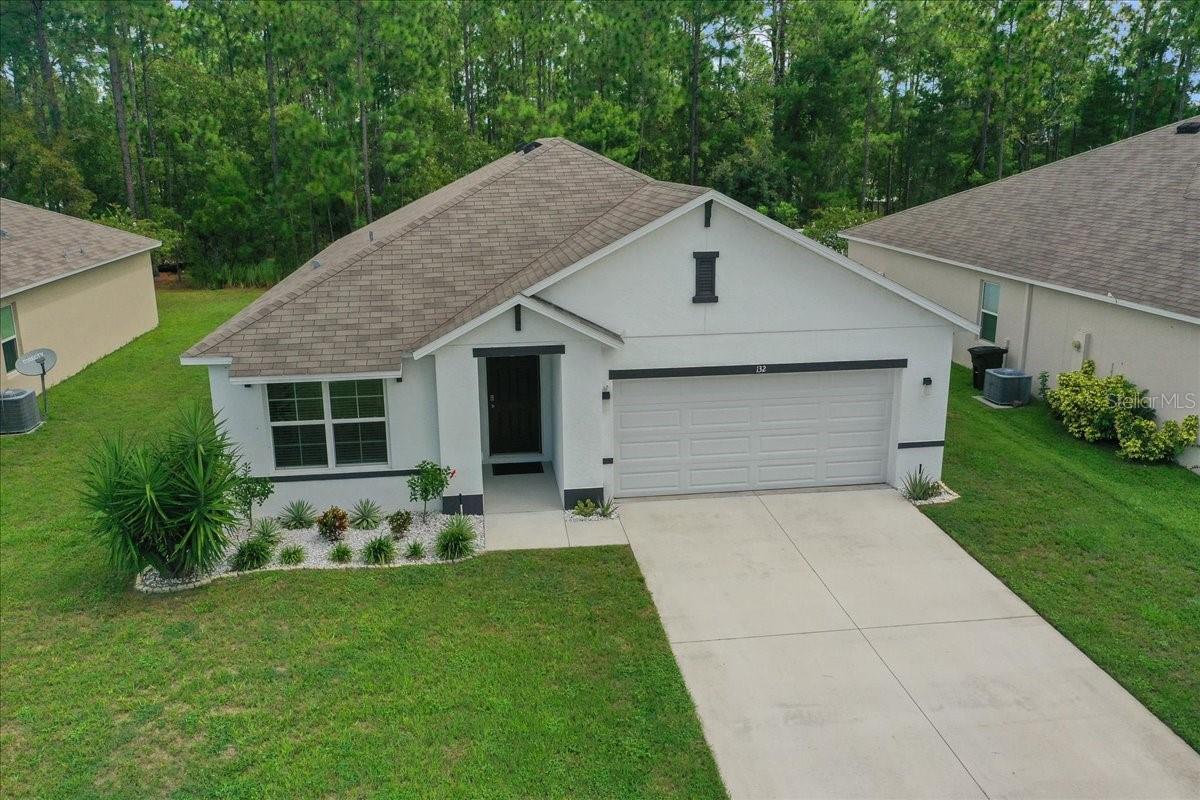 Smart Home with a Private, Peaceful Backyard!
This lightly lived-in 3-bedroom split-plan home offers an open layout that’s perfect for everyday living and entertaining. The kitchen features a granite breakfast bar, a large pantry, and stainless steel appliances. The owner’s suite boasts a spacious walk-in closet, dual sinks, and a roomy shower. Tile flooring is in all traffic areas with cozy carpet in the bedrooms.
Enjoy tranquil views of lush plants and mature trees—no rear neighbors! The screened lanai is the ideal spot for morning coffee or evening relaxation. Newer gated community with low HOA fees. Conveniently located near shopping, dining, and medical services. Seller is motivated and has priced this home to sell!