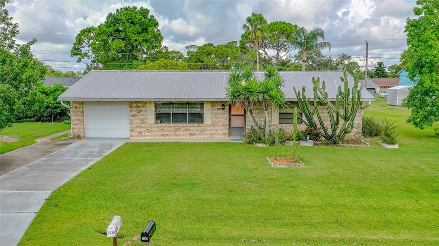 GREAT LOCATION ON LARGE 120’ FENCED YARD PROVIDING FOR EXTRA SPACE. THIS CONCRETE BLOCK 2-BEDROOM 2- FULL BATH HOME WITH A METAL ROOF IS IN A QUIET NEIGHBORHOOD WITHOUT A MANDATORY HOA. THE HOME ALSO OFFERS A SPACIOUS LIVING ROOM AS WELL AS AN ENCLOSED FLORIDA ROOM USED AS A FAMILY ROOM. OFF OF THE FLORIDA/FAMILY ROOM IS A SCREENED IN PORCH OVERLOOKING A MANACURED FENCED YARD. ATTACHED 1-CAR GARAGE ALONG WITH A SHED IN THE REAR YARD. THE LARGE REAR YARD IS GREAT FOR OUTSIDE ENTERTAINING OR THE ADDITION OF A CUSTOM DESIGNED POOL LATER. CLOSE TO THE ALL-INCLUSIVE NEWLY ADDED WHISTLE STOP PARK, INDIAN RIVER ELEMENTARY SCHOOL AND GROCERY SHOPPING PLAZA ALL WITHIN WALKING OR BICYCLING DISTANCE. THE SUBDIVISION WILL ALSO SOON BE CONNECTED TO THE REGIONAL RAILS TO TRAILS STATEWIDE PAVED TRAIL SYSTEM. CLOSE TO THE INDIAN RIVER WITH GREAT WATERFRONT PARKS AND BOAT LAUNCHING FACILITIES. SOUTHEAST VOLUSIA AREA IS ALSO KNOWN FOR GOOD SHOPPING AND GREAT RESTAURANTS. ;Water: City