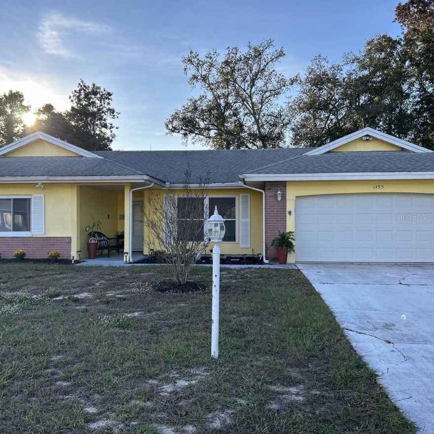 This delightful single-family home located at 1495 Bishop Rd in Spring Hill, FL offers a cozy retreat for its new owners. Built in 1977, this well-maintained property boasts a comfortable layout with 2 bathrooms, 4 bedrooms and a spacious living area spanning 1,565 square feet. Situated on a generous lot size of .20 acres. There is plenty of outdoor space for entertaining, gardening, or simply enjoying the Florida sunshine. The exterior features a classic design with a welcoming front porch and a large backyard perfect for hosting gatherings or relaxing in privacy. The lot size provides ample room for outdoor activities and potential for future expansion or customization. Stepping inside, you will find a warm and inviting interior with a functional floor plan that includes a spacious living room, dining area, kitchen, and two full bathrooms. The layout of the home offers comfort and convenience, ideal for everyday living and entertaining guests. The bedrooms are well-appointed with plenty of natural light and closet space, providing a peaceful retreat for rest and relaxation. The bathrooms are clean and well-maintained, featuring updated fixtures. Located in a desirable neighborhood in Spring Hill, FL, this property offers a peaceful setting with easy access to local amenities, schools, parks, and major roadways. Whether you are looking for a starter home, a downsizing option, or an investment opportunity, this property has the potential to suit a variety of needs and lifestyles.