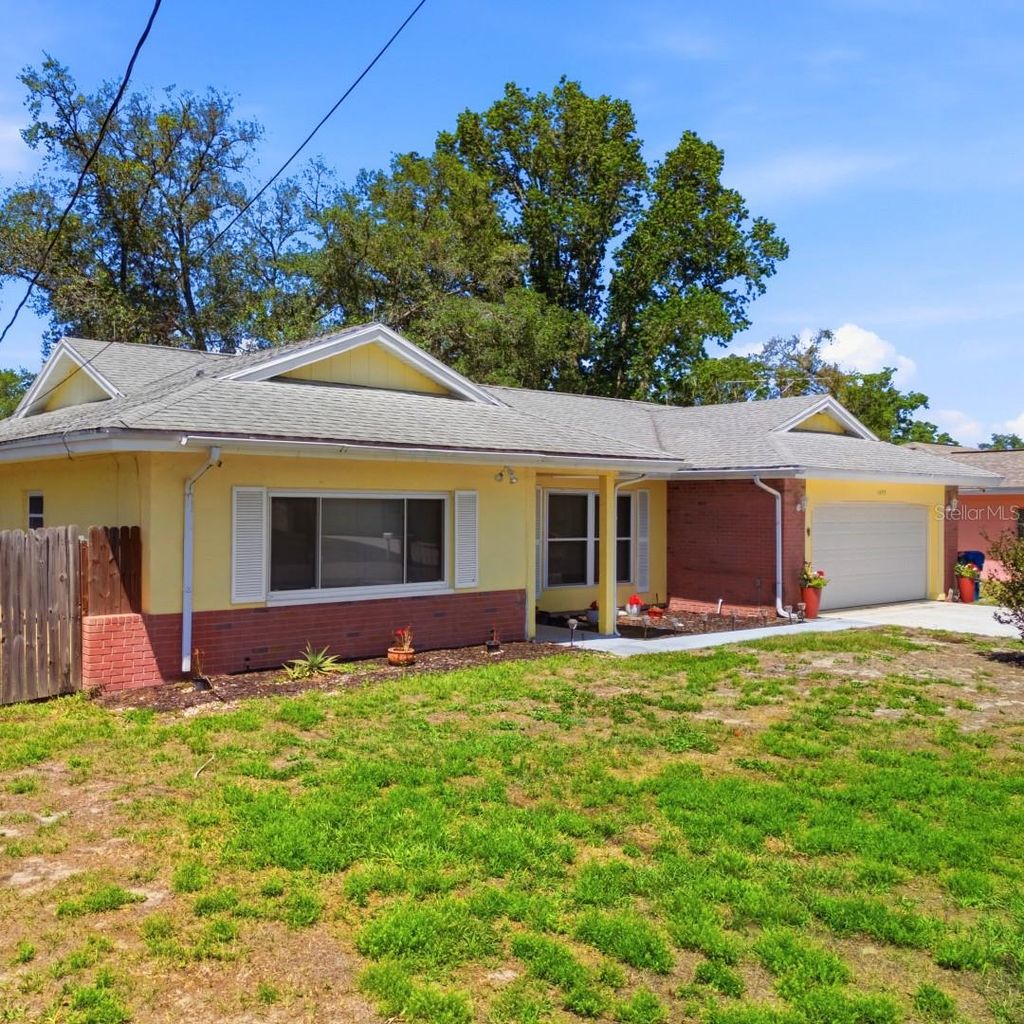 Photo of 1495 Bishop Road, Spring Hill, FL 34608 (MLS # GC535511)
