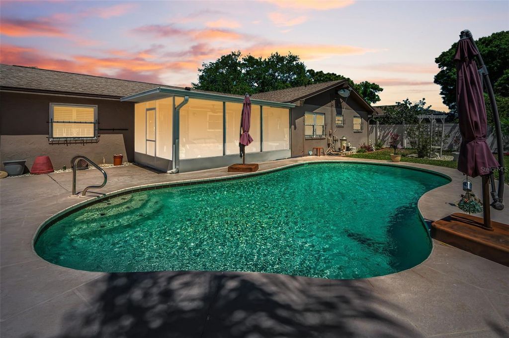 Photo of 2255 Wilshire Drive, Dunedin, FL 34698 (MLS # TB8489867)