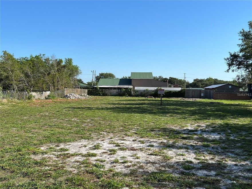 Numerous BUSINESS opportunities are possible with this large, cleared lot and it includes 10 paved parking spaces. This lot is located within the City of Apopka, zoned C-C for COMMUNITY COMMERCIAL DISTRICT. Allowed uses include retail sales, personal services, eating and drinking establishments, offices, recreation/entertainment uses, vehicle sales and services, mixed use, live/work, and multi-family dwellings above ground-level commercial and office uses.