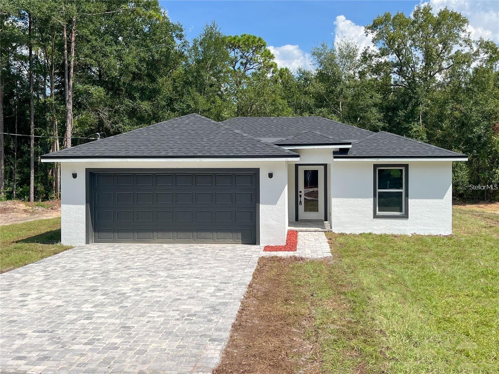 This home has all the extras you have been looking for, including granite countertops, stainless steel appliances, kitchen cabinets with 42" uppers, fully tiled shower and tub surrounds, and super-durable luxury vinyl plank flooring throughout, as well as a new fully sodded yard. The spacious open floor plan allows ample space for entertaining with an open concept Kitchen/Great Room.